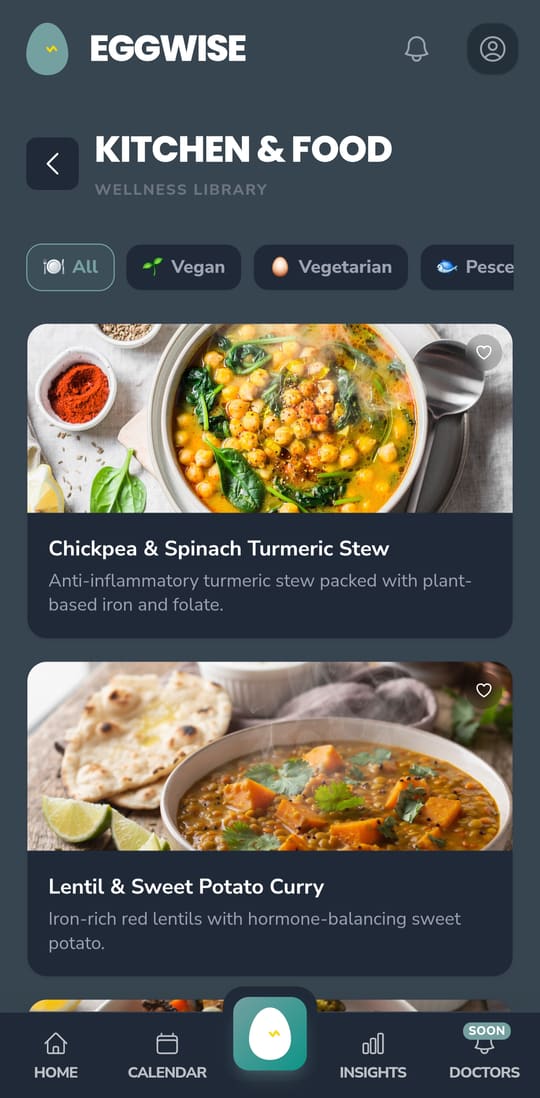 EggWise Kitchen and Food wellness library showing fertility recipes including chickpea spinach turmeric stew and lentil sweet potato curry, with vegan, vegetarian, and pescatarian filter chips